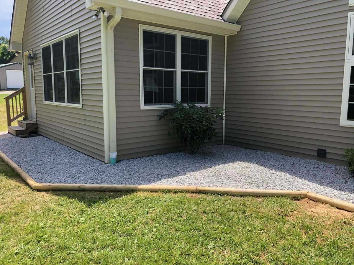 LandscapingServicesMartinsville A landscaped bed and yard by Anthony's Landscaping
